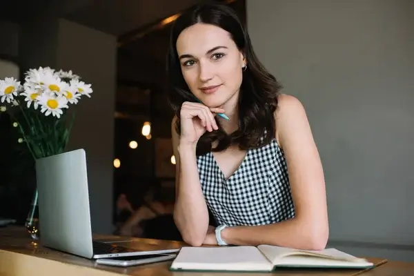 depositphotos 498473740 stock photo attractive intelligent smiling female author